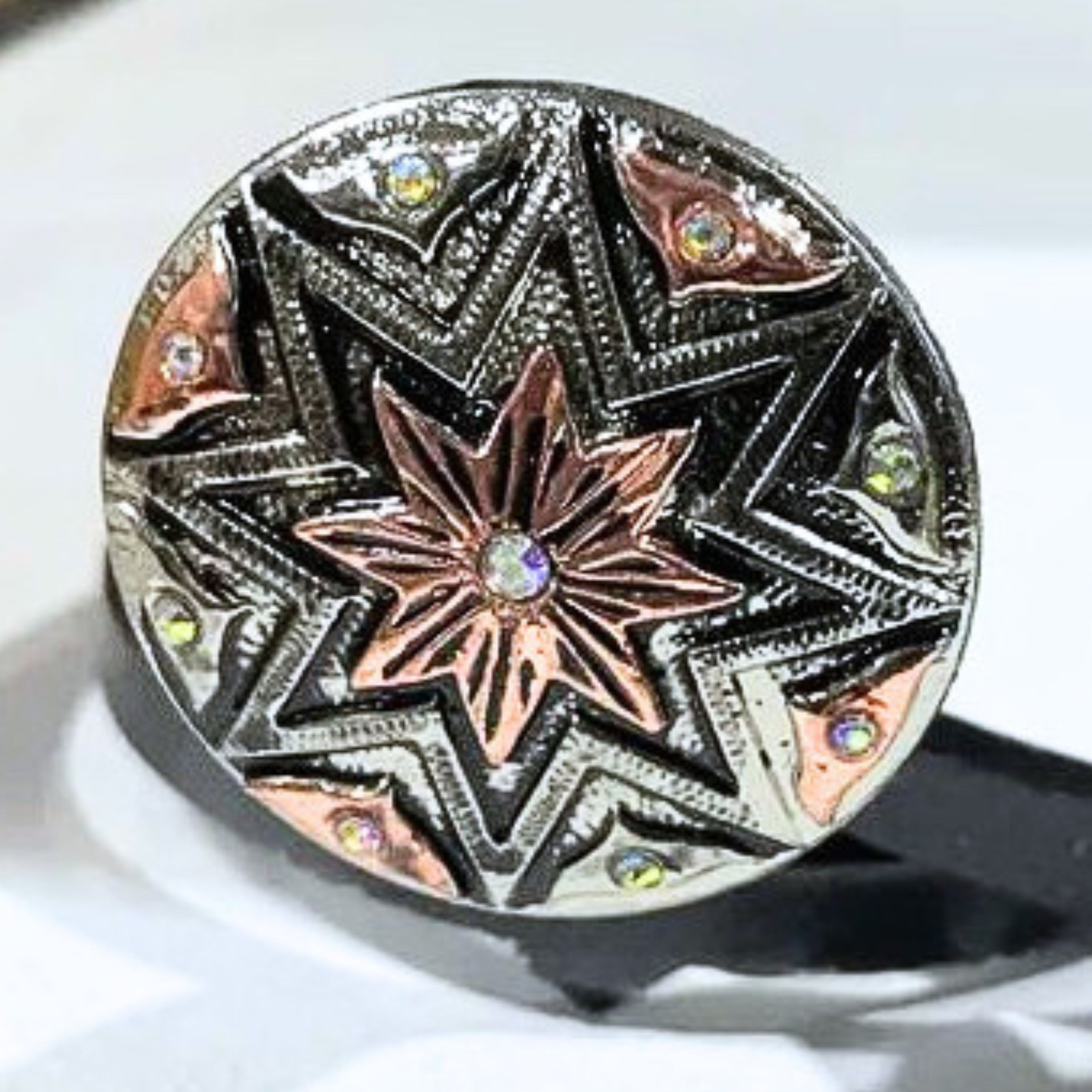 Front view of the Angel Fire Cowgirl Cuff featuring a Southwestern starburst design, crystal accents, and mixed-metal western detailing.