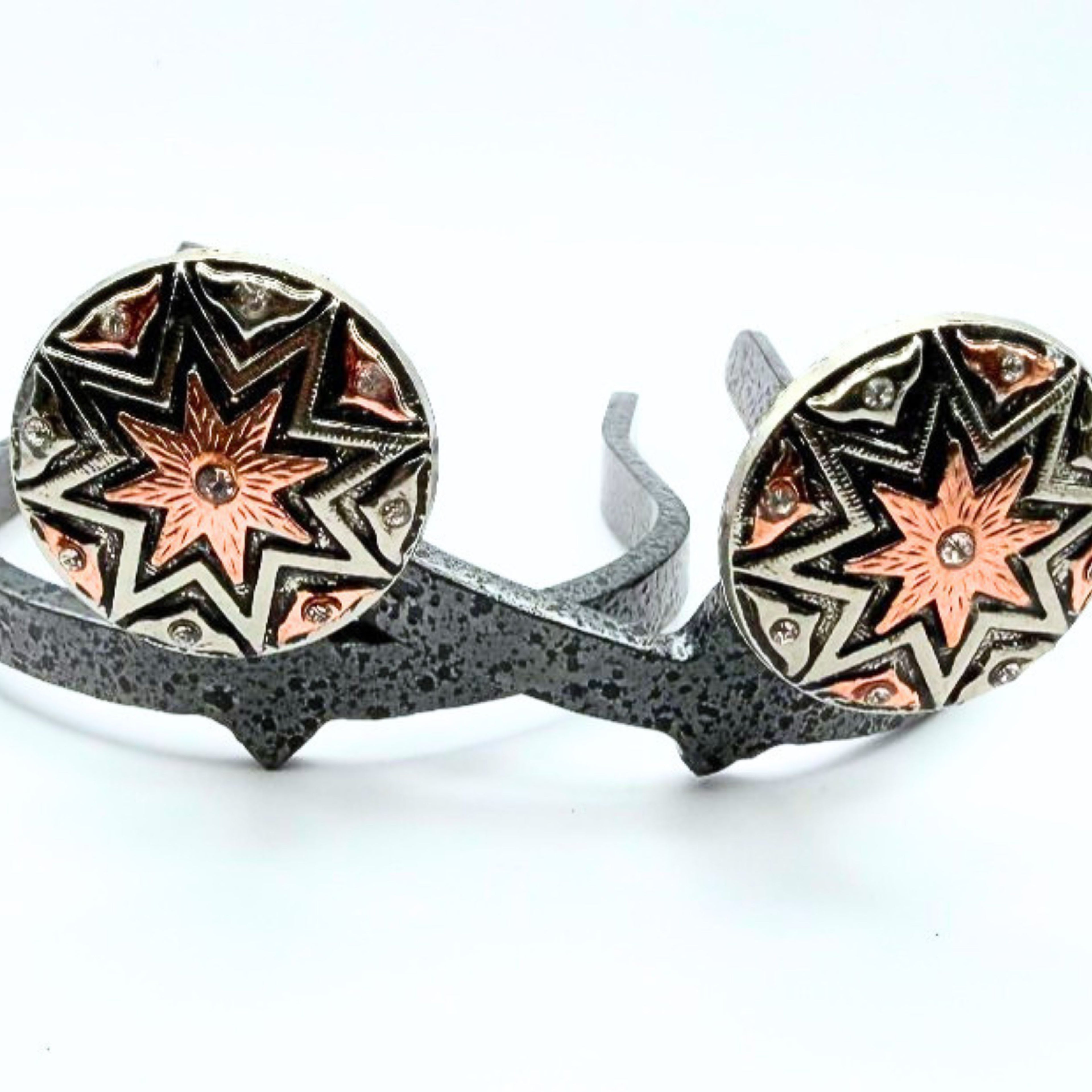 Handcrafted Angel Fire Cowgirl Cuff featuring a geometric starburst pattern, crystal accents, and mixed-metal finishes designed for cowboy boots and jean hem protection.