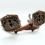 Handcrafted Black Thunderbird Cowgirl Cuff featuring a Southwestern thunderbird design, antique copper bead accents, and western styling for cowboy boots and jean hem protection.