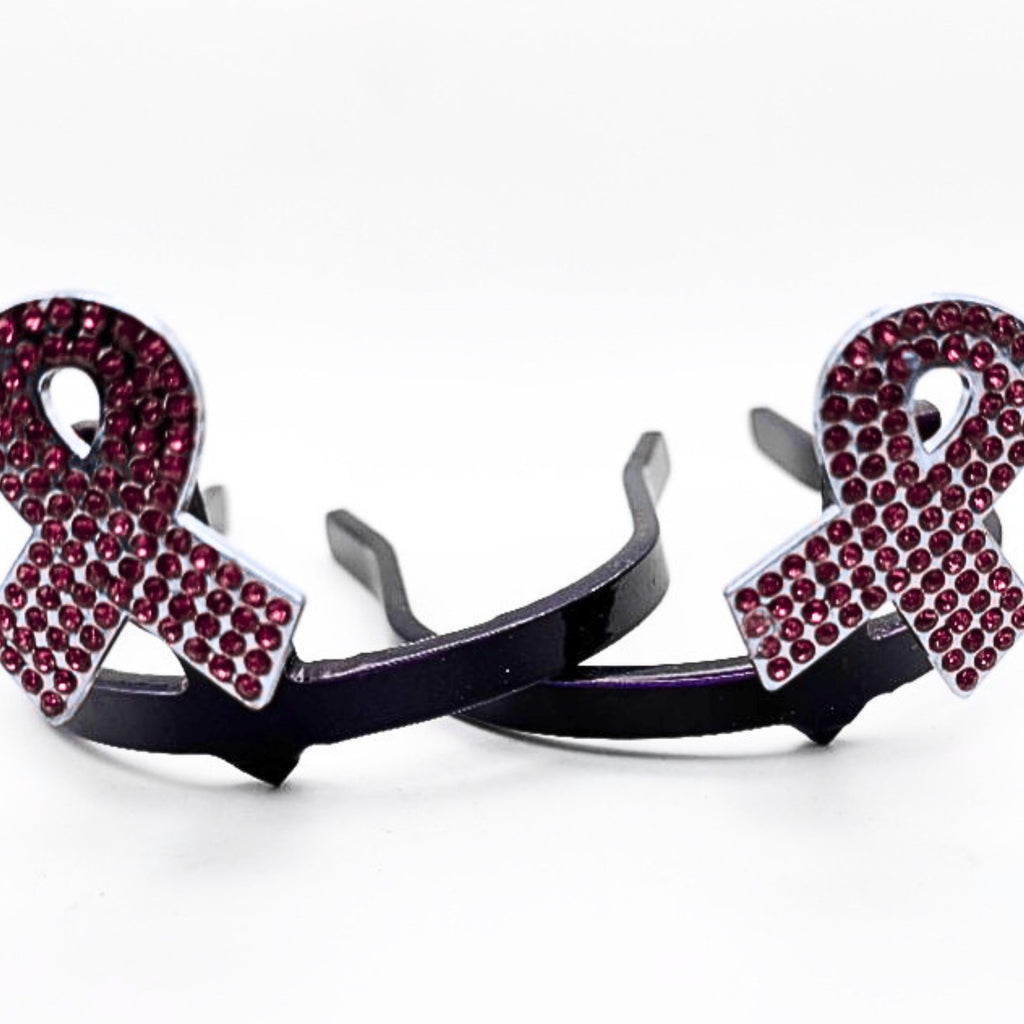 Breast cancer awareness ribbon Cowgirl Cuff featuring pink rhinestones and silver-tone detailing. Handcrafted western boot accessory designed to keep jean hems off the ground.