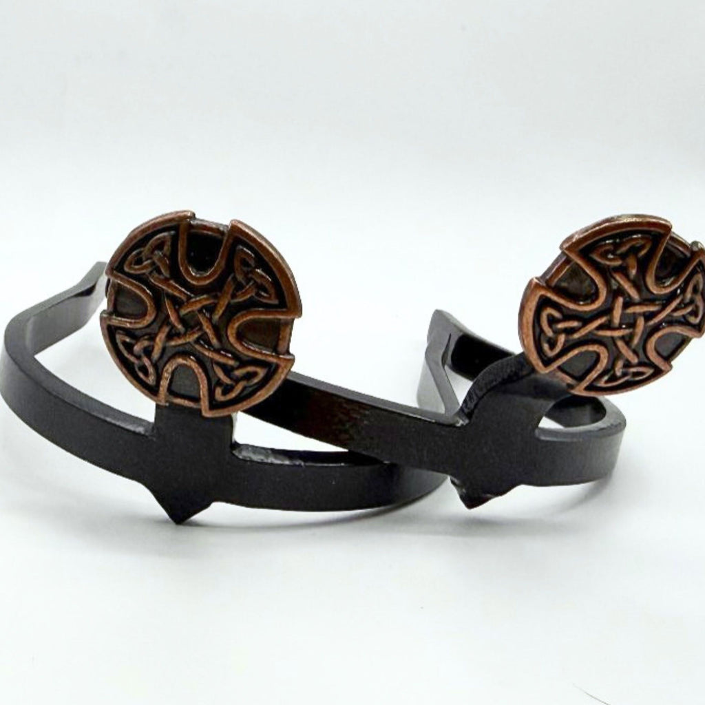 Antique copper Celtic cross Cowgirl Cuff with traditional Celtic knot detailing on a black western boot accessory for cowboy boots and western fashion.