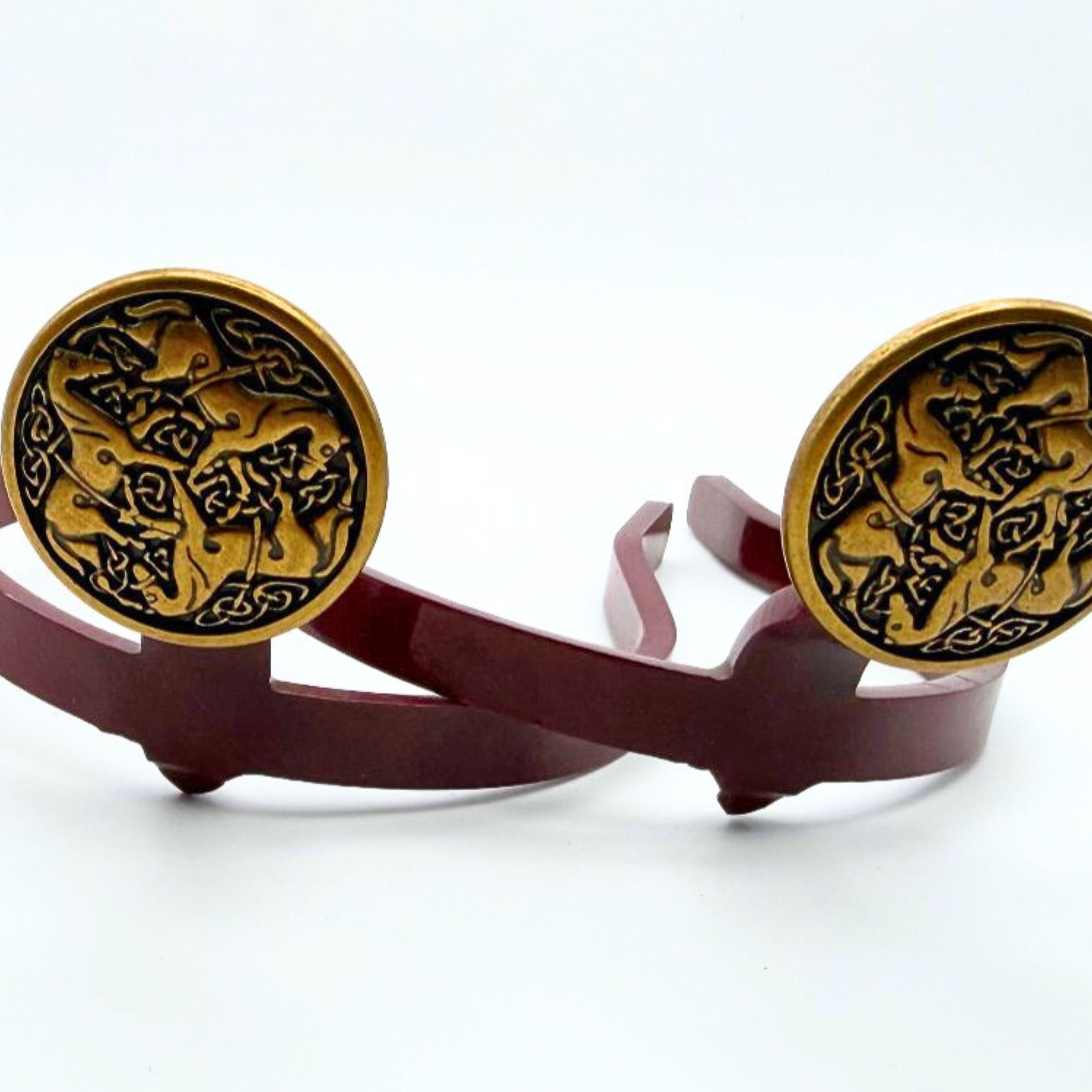 Celtic Horses Cowgirl Cuff featuring three intertwined horse silhouettes in antique gold knotwork design on a handcrafted western boot accessory that helps keep jean hems off the ground.