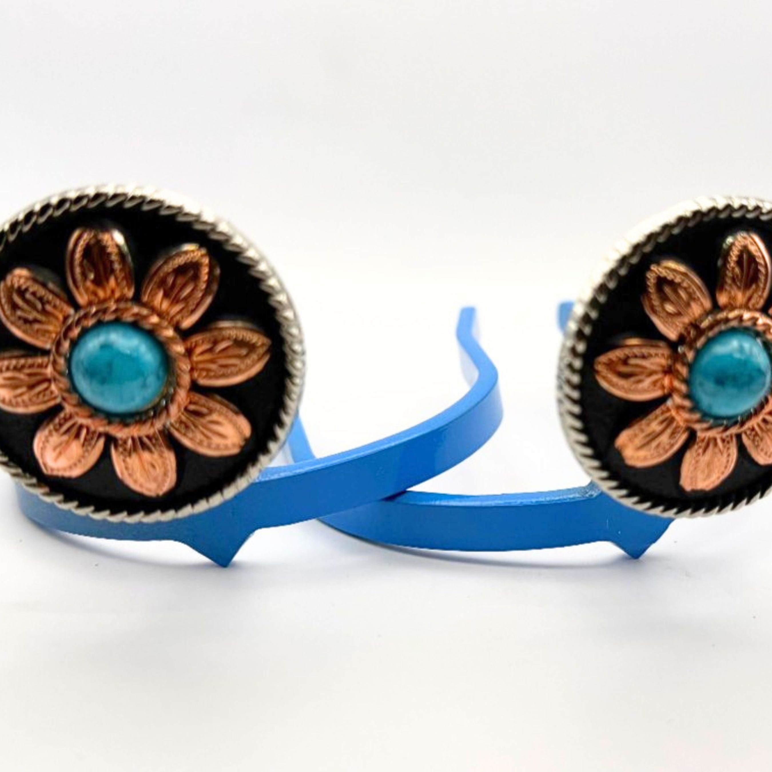 Copper flower Cowgirl Cuff featuring engraved floral petals, turquoise center stone, rope-edge detailing, and handcrafted western boot accessory styling for cowboy boots.