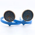 Copper patina Cowgirl Cuff featuring engraved floral western detailing, scrollwork accents, and antique copper finish. Handcrafted boot accessory designed to protect jean hems and complement cowboy boots.