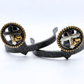 Cowboy at the Cross Cowgirl Cuff featuring a silver-tone cross and gold-tone kneeling cowboy design with antique western detailing. Handcrafted boot accessory that helps keep jean hems off the ground.