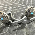 Handcrafted Navajo cross Cowgirl Cuff featuring silver-tone western conchos with turquoise stone accents, designed to attach to cowboy boots and help keep jean hems off the ground.