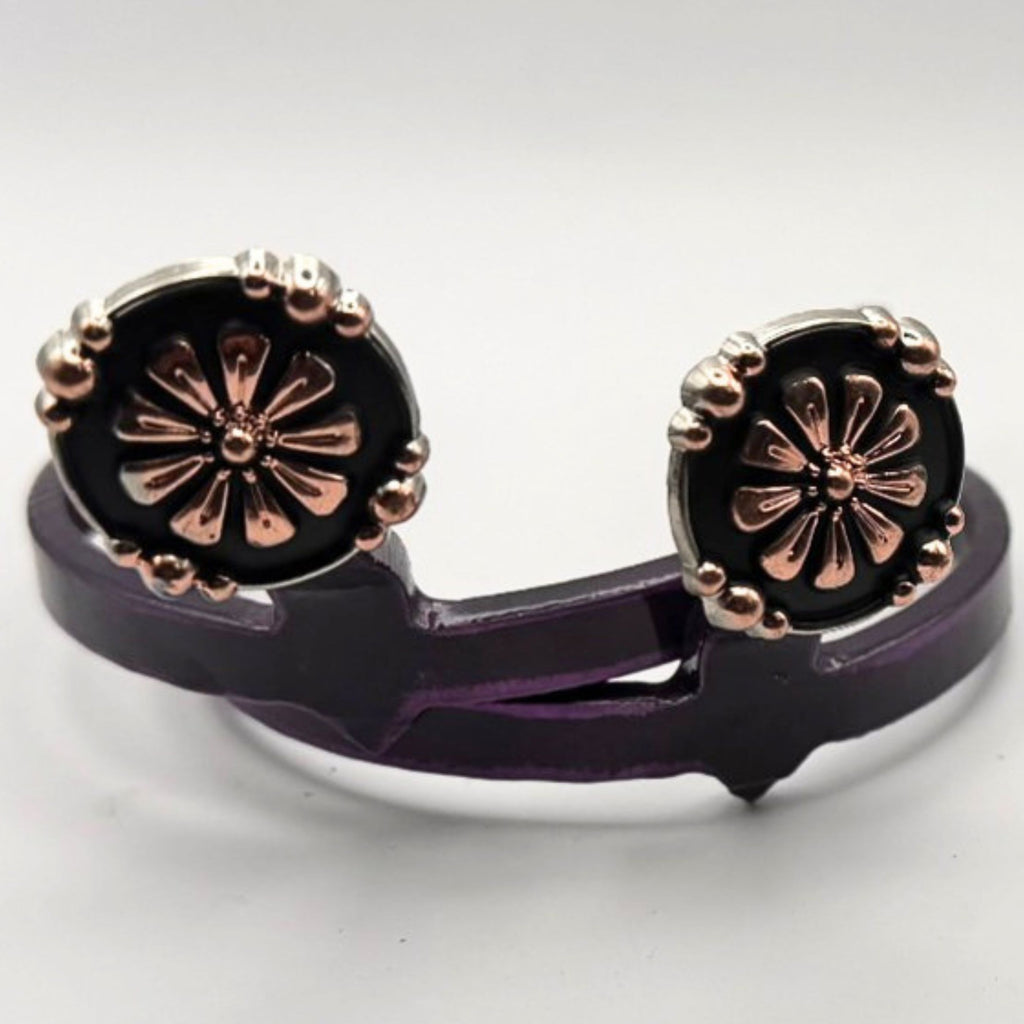 Handcrafted Oaxaca Floral Concho Cowgirl Cuff featuring copper-tone floral details, black enamel background, silver-tone beaded border, and southwestern western boot accessory styling.
