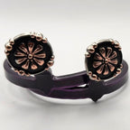 Handcrafted Oaxaca Floral Concho Cowgirl Cuff featuring copper-tone floral details, black enamel background, silver-tone beaded border, and southwestern western boot accessory styling.