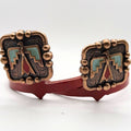Handcrafted Red & Turquoise Thunderbird Cowgirl Cuff featuring a Southwestern thunderbird design with turquoise and red enamel accents in an antique copper-tone setting, western boot accessory for jean hem protection.