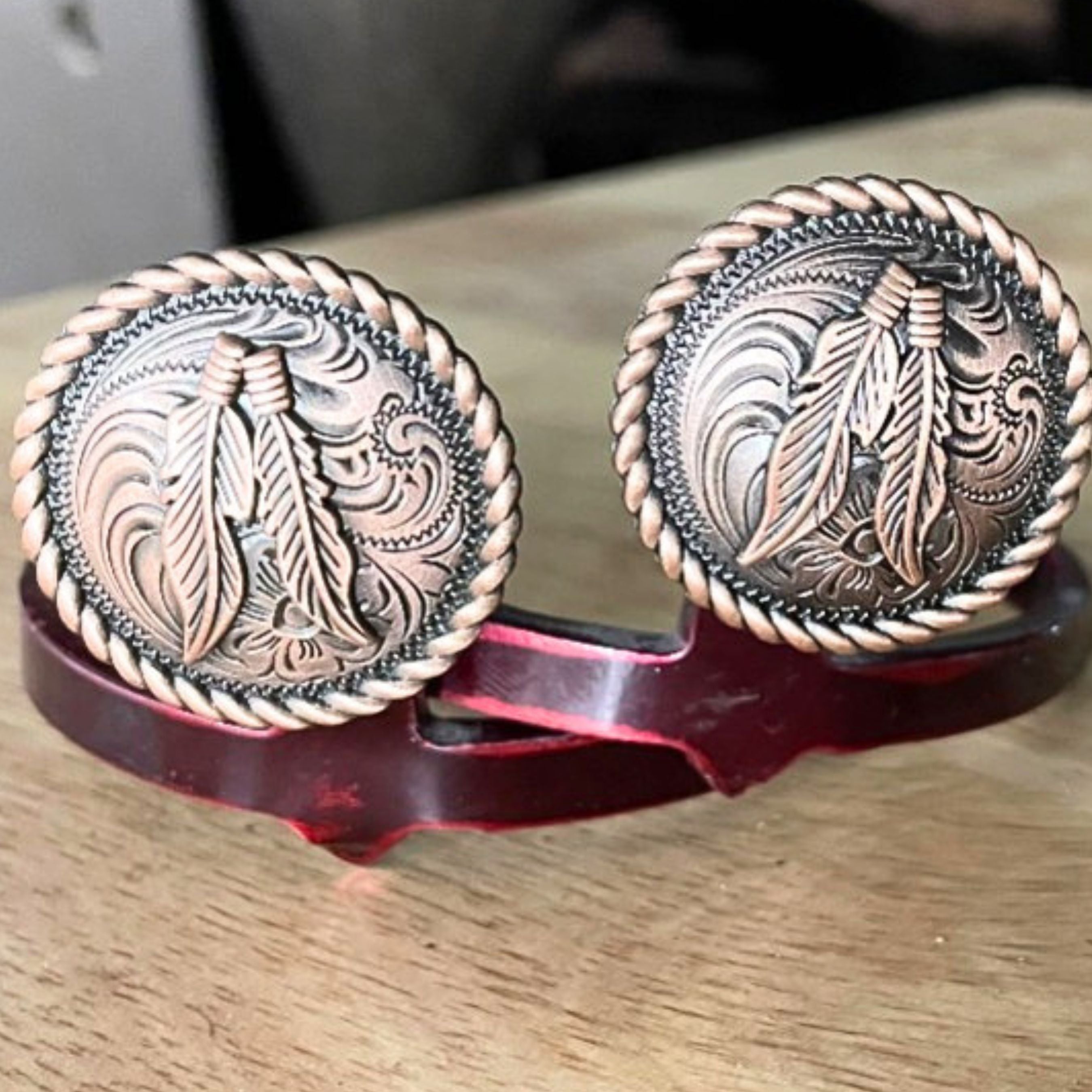 Rope edge feather Cowgirl Cuff with copper and silver-tone western medallions, tooled detailing, and handcrafted boot accessory styling.