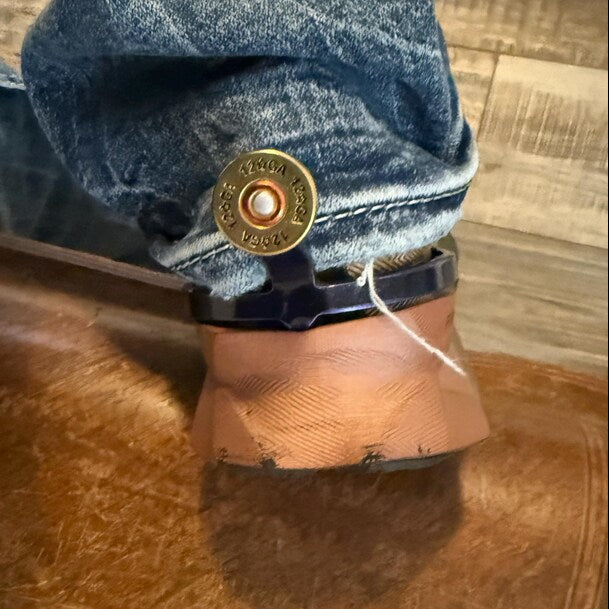Verified customer wearing the Shotgun Shell Cowgirl Cuff, a handcrafted western boot accessory made from shotgun shell accents that helps protect jean hems from dragging.