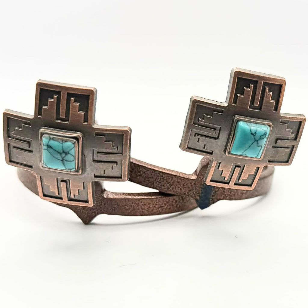 Silver cross Cowgirl Cuff featuring a turquoise stone center and geometric Southwestern detailing. Handcrafted western boot accessory for cowboy boots and western fashion.