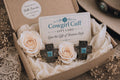 Cowgirl Cuff digital gift card in a western-themed gift box featuring handcrafted boot accessories, blush roses, lace details, and rustic styling, perfect for cowgirl gifts, western fashion lovers, and special occasions.