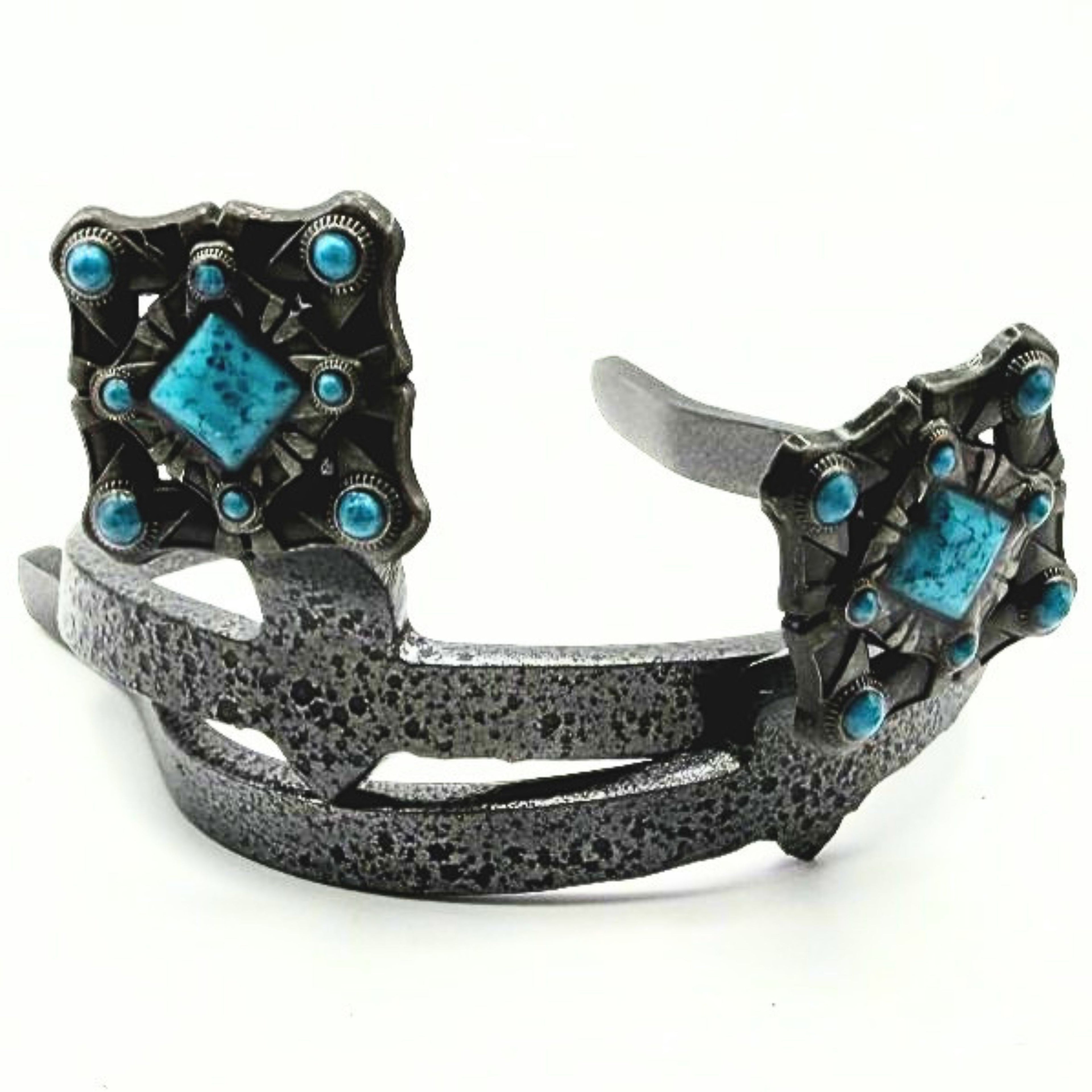 Handcrafted Western Sunset Cowgirl Cuff featuring turquoise-style center stones, Southwestern geometric detailing, and antique dark metal accents designed for cowboy boots and jean hem protection.